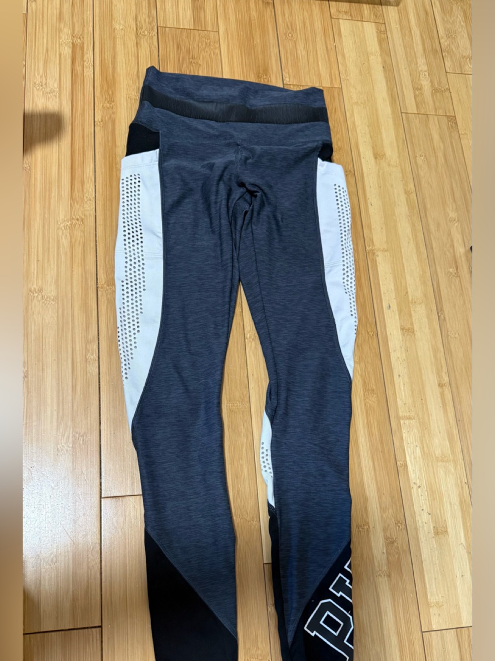 PINK Dri-Fit black & navy leggings with white perforated panels